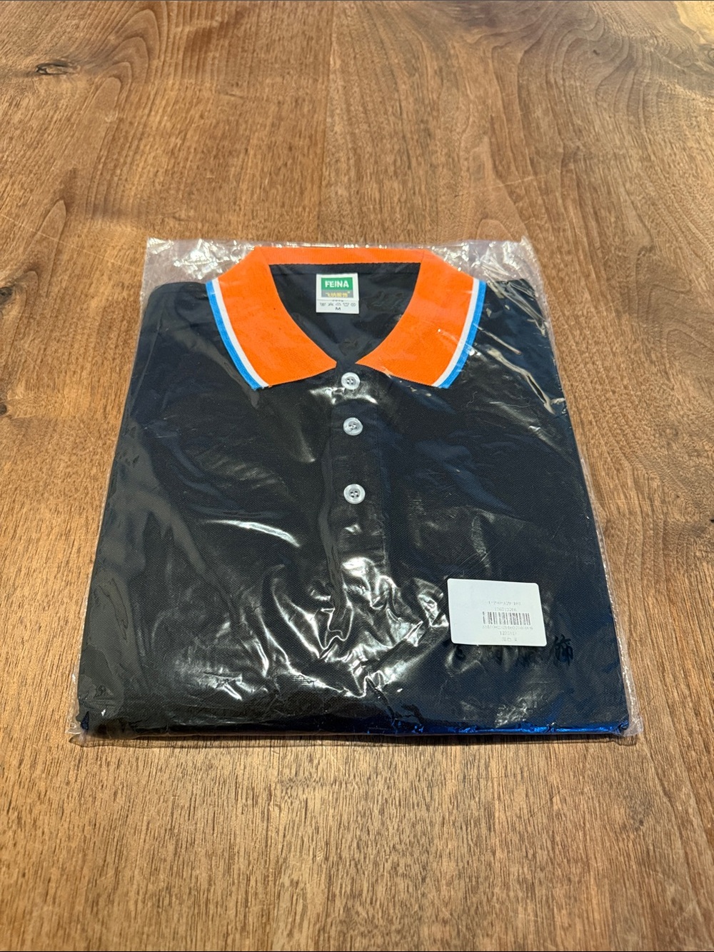 *NWT* FEINA Polo - M